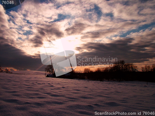 Image of Sunset over winter field