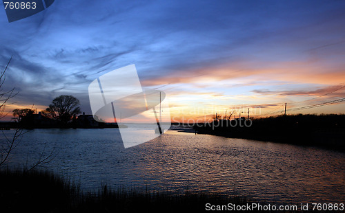 Image of sailing with a beautiful sunset