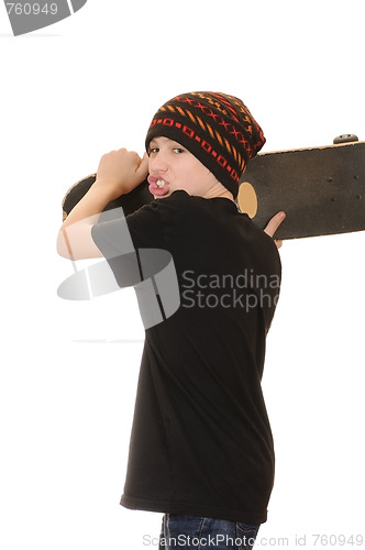 Image of The teenager with a skateboard 