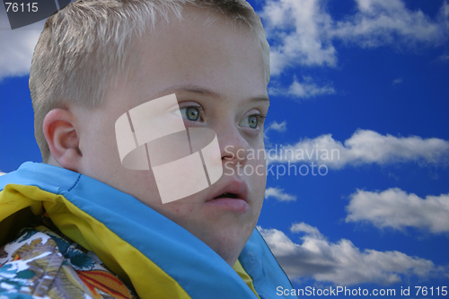 Image of Down Syndrome Boy with Head in the Clouds