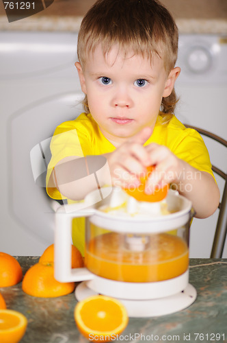 Image of The child to wring out juice