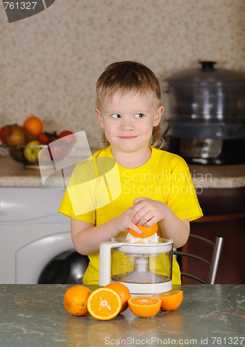 Image of The child to wring out juice