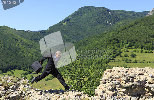 Image of Businessman running