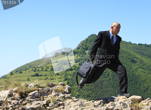 Image of Businessman running