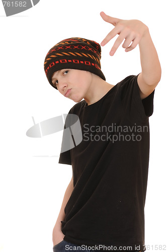 Image of The teenager in a black vest and a hat