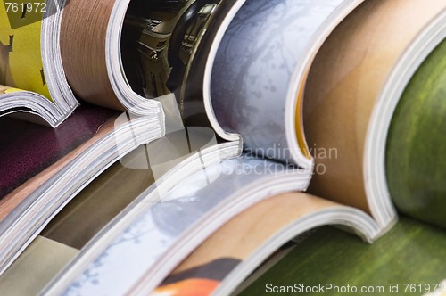 Image of Stack of open magazines