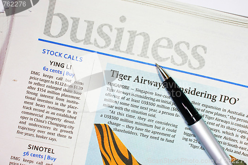 Image of Business Newspaper & Pen