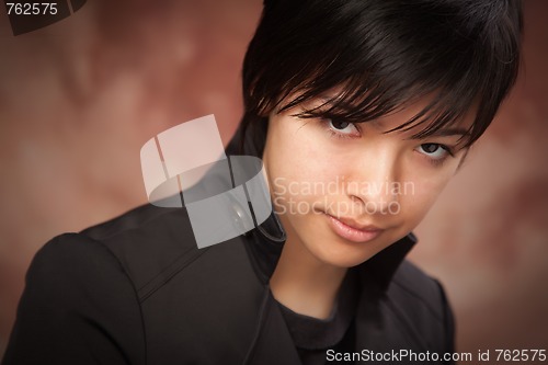 Image of Attractive Ethic Girl Poses for Portrait