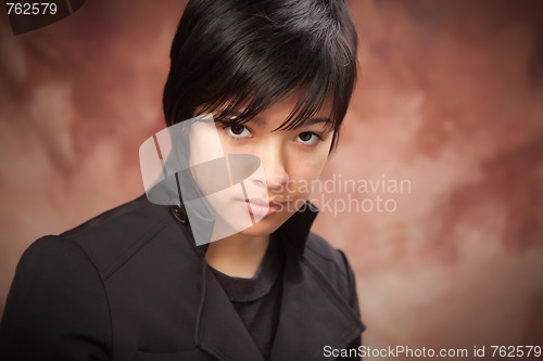 Image of Attractive Ethic Girl Poses for Portrait