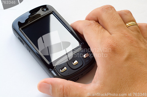 Image of Holding pda and stylus