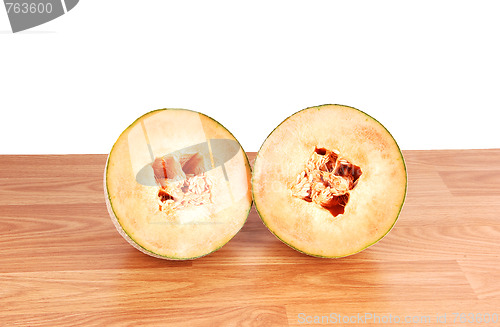 Image of Two halve cantaloupes.