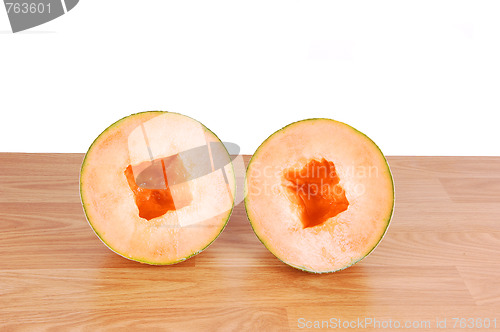 Image of Two halve cantaloupes.