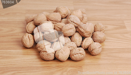 Image of A pail of walnuts.