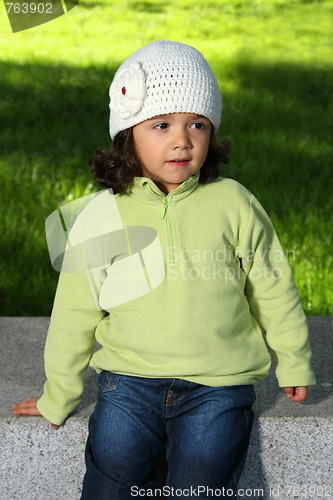 Image of Cute girl in autumn park