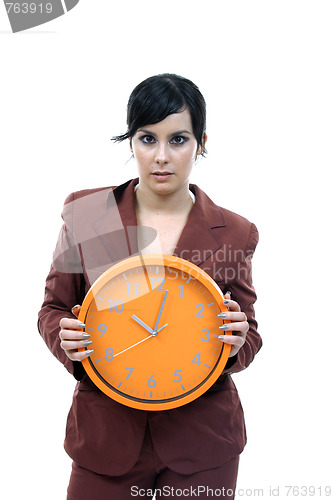 Image of sexy businesswoman with clock, business photo