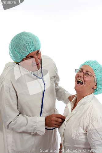 Image of mature doctor couple, team of doctors, healthcare photo