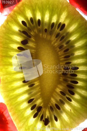 Image of beautiful and fresh pomegranate grains and kiwi