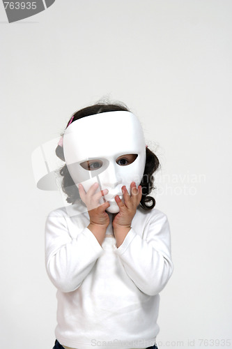 Image of child with white mask