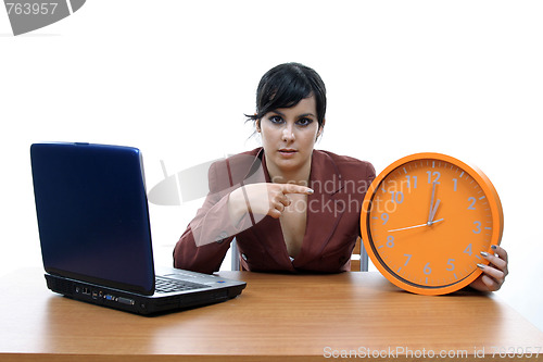 Image of sexy businesswoman with clock, business photo