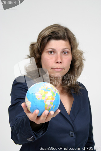 Image of young pretty woman with Earth