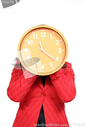 Image of sexy businesswoman with clock, business photo