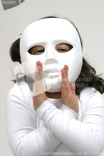 Image of child with white mask