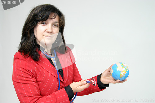 Image of young pretty woman with Earth