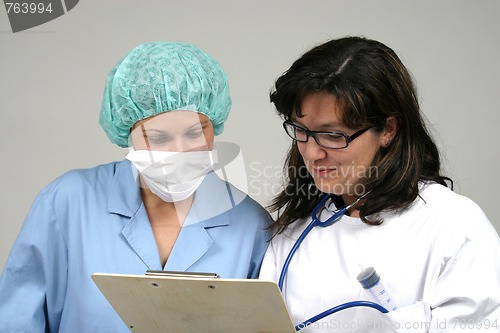 Image of Doctor isolated on white, beautiful nurse woman