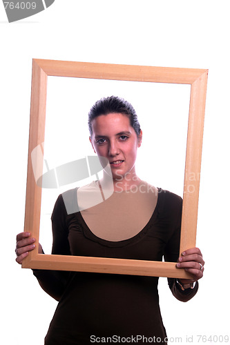Image of Portrait of a beautiful young woman with frame