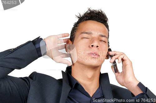 Image of Young business man with mobile