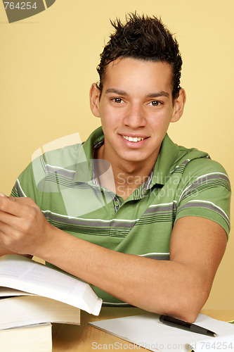 Image of Young student studying at home