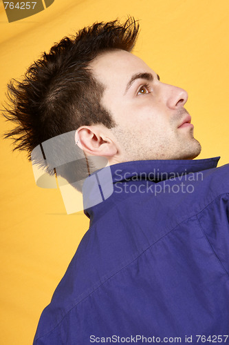 Image of Young man with blue shirt