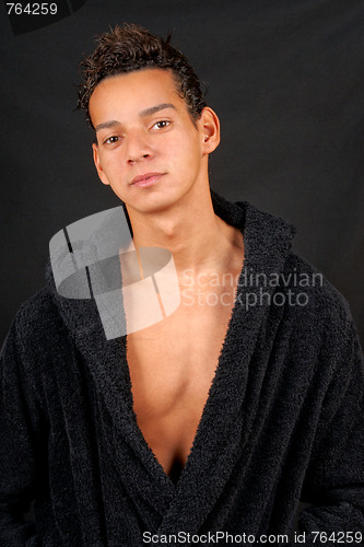 Image of Sexy young man with bathrobe