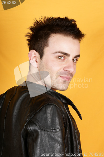 Image of Young man with black leather jacket