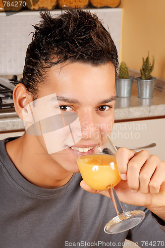 Image of Young man drinking