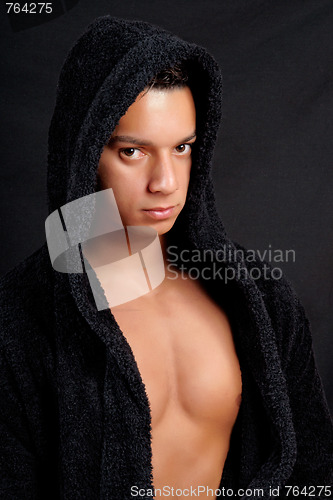 Image of Young man with black bathrobe