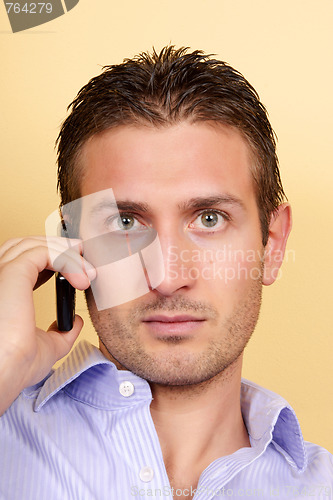 Image of Young man with mobile