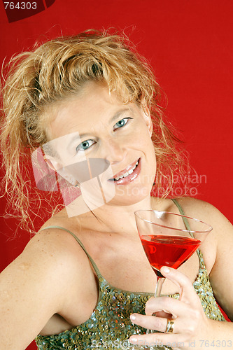 Image of Blond woman with red drink