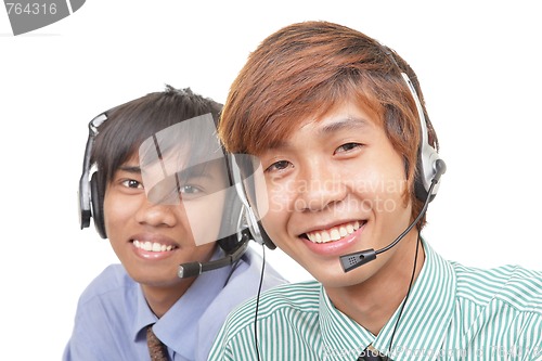 Image of Two Asian call center agents