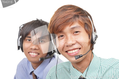 Image of Two Asian call center agents
