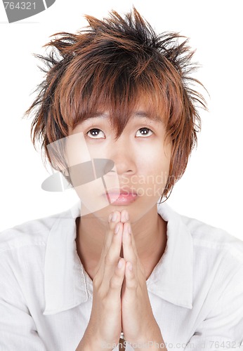 Image of Praying Korean teen portrait