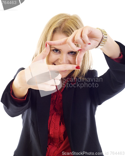Image of A woman looking through her fingers