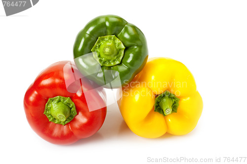 Image of colored peppers on white background