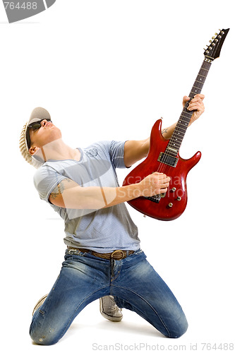 Image of Attractive musician playing guitar