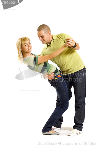 Image of Young couple dancing