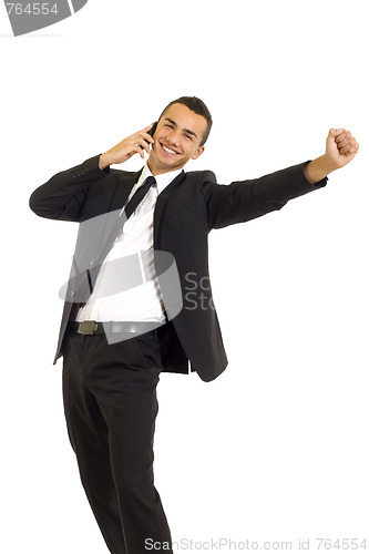 Image of  young business man discussing on a cell phone