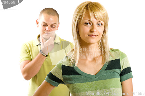 Image of man checking a woman out