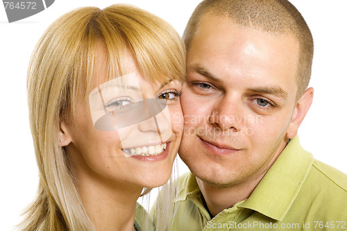 Image of Happy young man and woman standing together