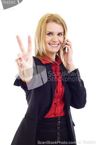 Image of businesswoman on the cell phone celebrating