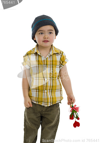 Image of cute boy with flower and heart gift